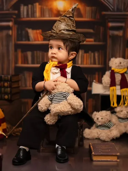 We bring magical worlds to life, like this Harry Potter themed toddler shoot. Our studio is equipped with detailed backdrops, costumes like the sorting hat and scarf, and props to create an authentic and enchanting experience for your little wizard.