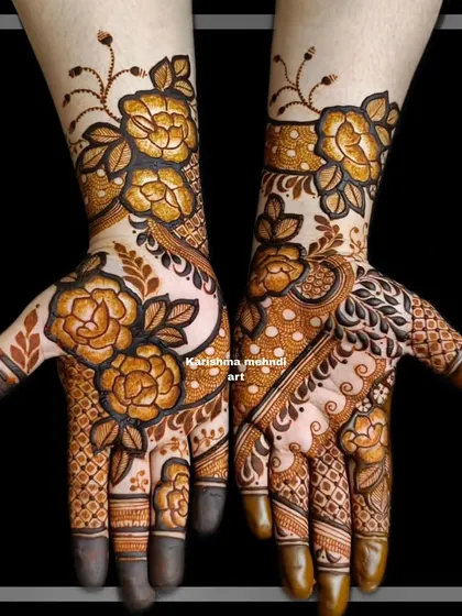 A close-up of the modern floral design from the previous video. The image clearly shows the contrast between the bold flowers and the delicate, airy patterns on the palm.