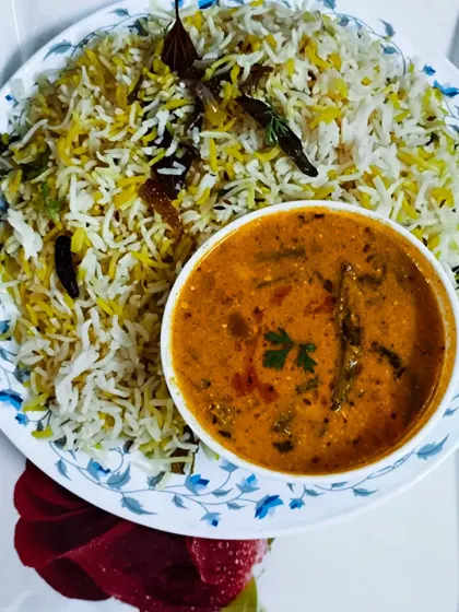 A serving of my Bagara Rice with a side of mixed vegetable kurma. A classic and comforting combination.