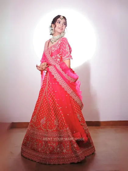 Love season calls for twirls in pink! This full-length shot shows the beautiful volume of the lehenga.