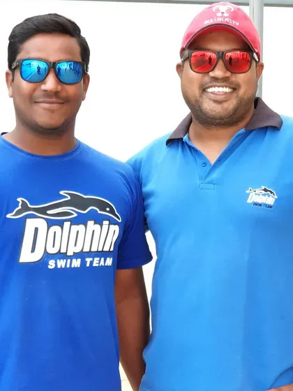 A picture with my fellow coach, Madhu sir. We work together as a team to provide the most complete coaching for our swimmers.