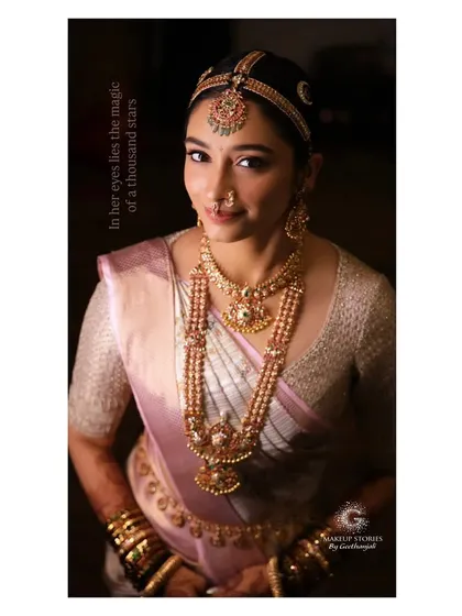 "In her eyes lies the magic of a thousand stars." This portrait of Mithila captures the essence of my makeup philosophy: to let the bride's inner beauty shine through.