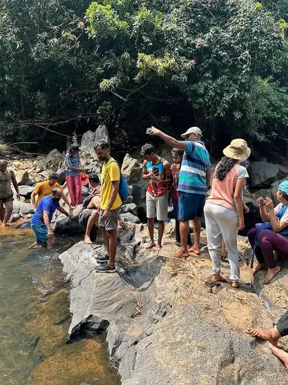 The group getting ready for a dip in the river, a perfect way to beat the heat during a summer trek.
