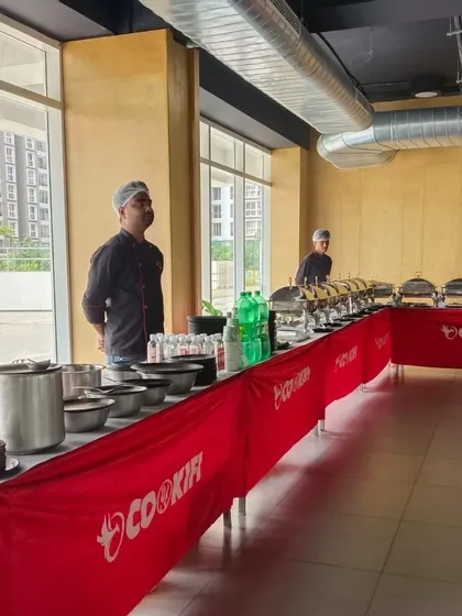Our team setting up for a party in the clubhouse of Godrej Nurture. We are experts in apartment and society event catering.