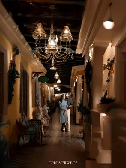 The right location can transport you. This elegant, warmly lit corridor gave Atul and Rachita's pre-wedding shoot a timeless, almost European feel. I love using architectural details and ambient light to create a mood of sophisticated romance.