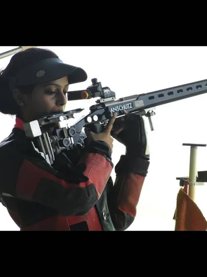A close-up of a national squad athlete with her Anschutz rifle during a training session, highlighting the professional-grade equipment used at my facility.