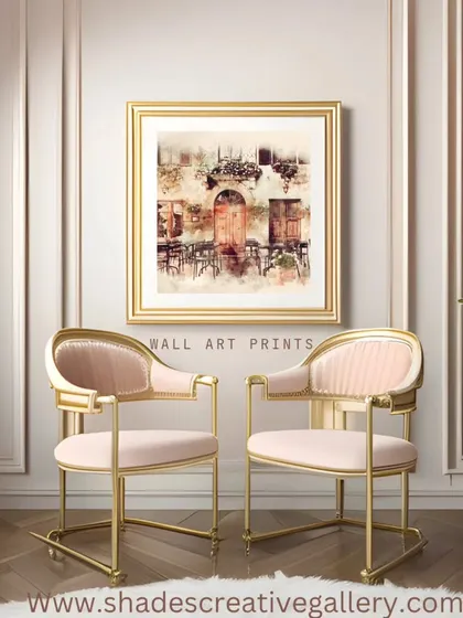 Fine art prints are an excellent way to start your art collection. This print of a charming European street scene, elegantly framed in gold, adds a touch of classic beauty to this seating area.
