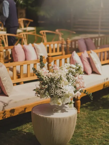 A soft floral arrangement in a simple vase, showing that even the smallest details are thoughtfully curated.