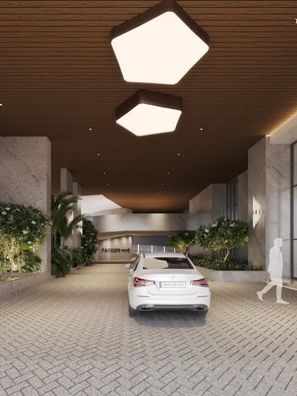 The driveway of our 'Urban Forest' project in Malabar Hill. The entrance is designed to provide a serene escape from the city, with cascading greenery and abstract architectural forms creating a unique arrival experience.