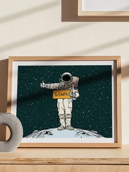 A fun and whimsical print of an astronaut hitchhiking "To Earth." This piece is perfect for a kid's room, nursery, or any space that could use a touch of cosmic adventure and imagination.