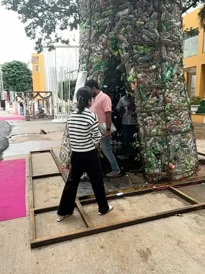 Visitors interacting with the "Plastreen" installation at the ACETECH exhibition. The goal was to create a public awareness campaign about reducing plastic use.
