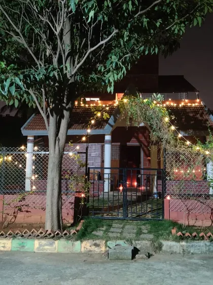 Our home, lit up for the evening. I've created a safe, welcoming, and beautiful environment for the dogs in my care, located within a secure, gated society for extra peace of mind.