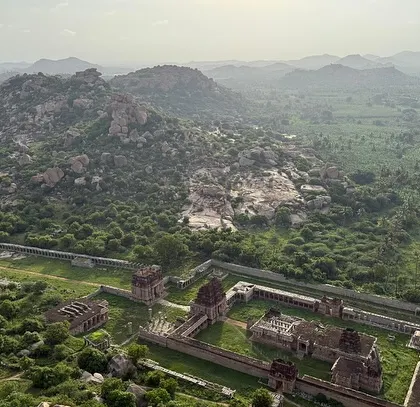 An aerial view of the Elephant Stables and other ruins in Hampi. The scale of the ancient city is breathtaking.
