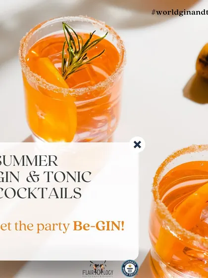 Let the party Be-GIN! A beautiful image of a summer gin and tonic, garnished with rosemary and an orange peel, to inspire your next drink.