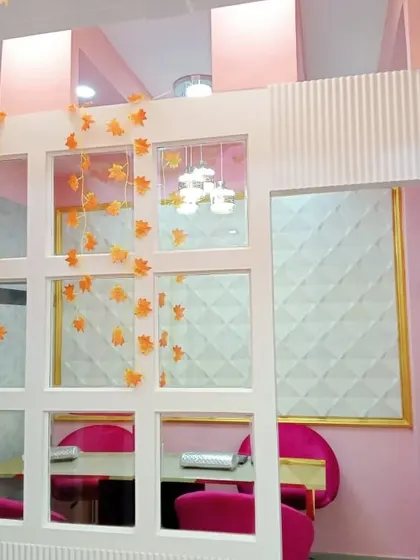A design detail from our Koramangala studio, showing the stylish partitions and decor that create a pleasant ambiance.