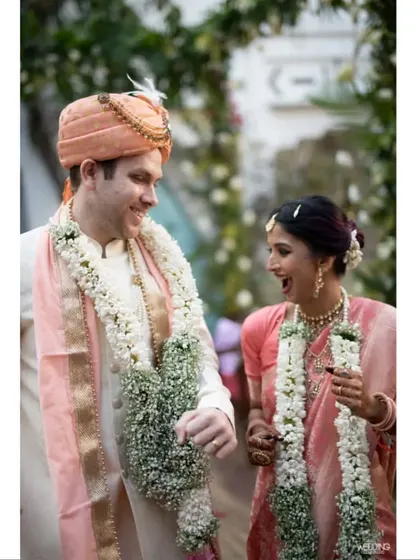 A candid moment of shared laughter between the bride and groom. Their natural chemistry and happiness are the true centerpiece of the wedding day, a testament to a love story we were honored to help celebrate.