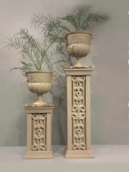 For a touch of classic elegance, our colonial planters are the perfect choice. These ornate urns on pedestals add a sense of grandeur and history to your garden.