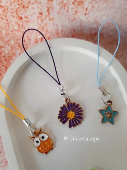 A closer look at the owl, star, and daisy enamel charms. I love sourcing these unique pieces to use in my custom creations.