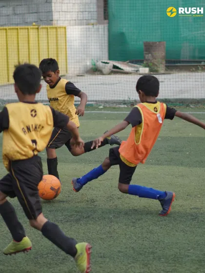 An action shot of a player making a tackle. We teach our players to be strong and decisive in both their offensive and defensive plays.