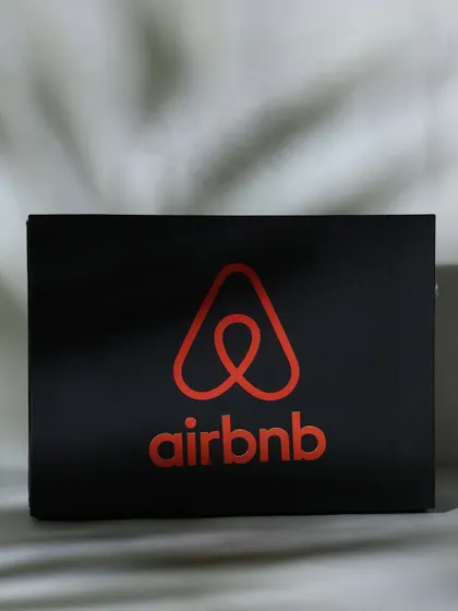 The exterior of the Airbnb gift box, featuring a clean, bold logo. The box itself is part of the premium experience, setting the tone before it's even opened.