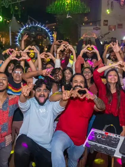 Another shot with our amazing audience in Pune, making heart signs with us. You guys are the best.