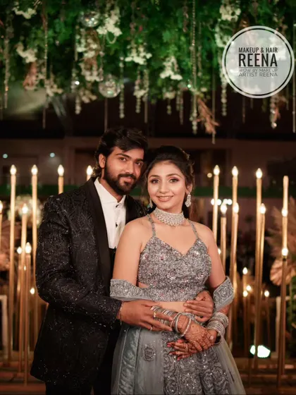The happy couple at their sangeet. Aarjavi's sparkling grey lehenga and glamorous makeup were a perfect combination.
