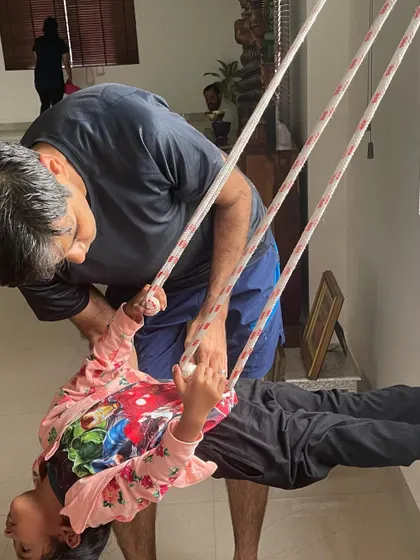 Another moment of playful exploration on the yoga ropes. I guide each child to feel safe and confident as they discover what their bodies can do.