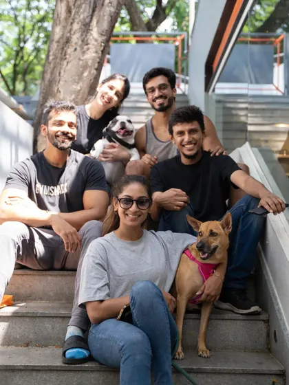 A group of friends and their dogs enjoying the day at the Pups + Parents breakfast. It's wonderful to see such a strong community of animal lovers supporting our cause.