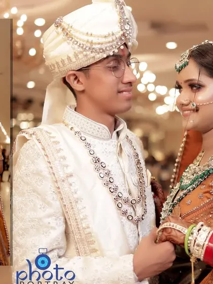 A sweet, candid moment between the bride and groom, perfect for a wedding album that tells their love story.