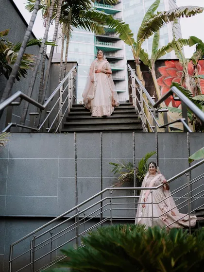 A creative composition showing the bride on a modern staircase, capturing her from different perspectives.