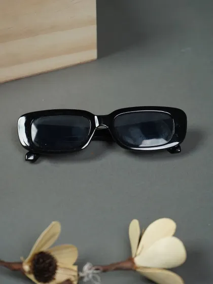 A pair of classic, stylish black sunglasses, a great addition to any birthday gift for him.