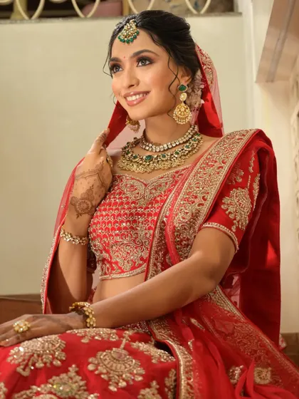 Another beautiful portrait of the bride in her red lehenga.