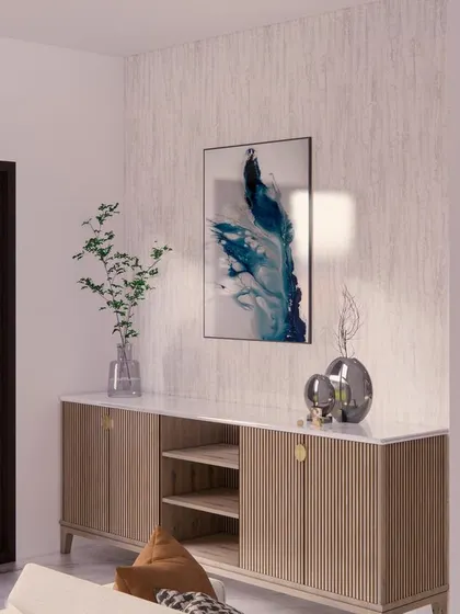 A sleek console table against a textured wallpaper, providing a stylish storage solution by the entrance.