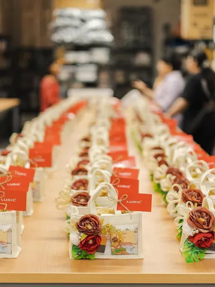 Rows and rows of festive gift bags ready for curation. Prepping our packaging in advance is key to managing the Diwali rush.