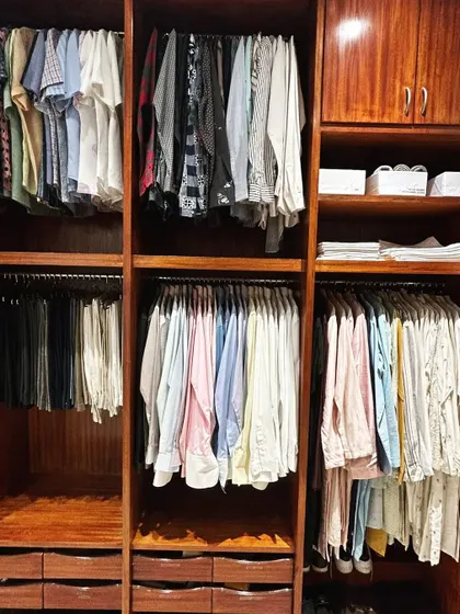 There is no simpler way to manage your closet than hanging your clothes. I advise clients to install solid hanging rods and hang all woven clothes, keeping only knits and inners folded.