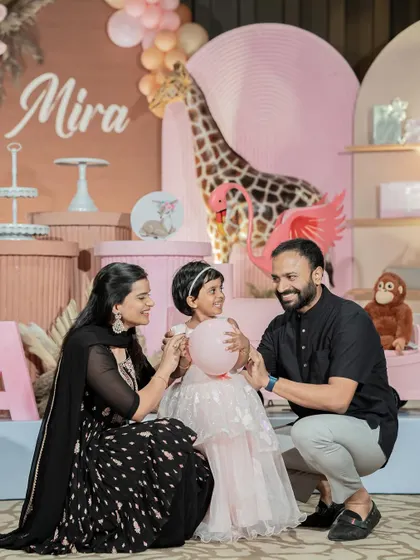 A sweet family moment at the "Pink Safari" party. We design our setups to be interactive and fun, creating natural opportunities for beautiful photos.