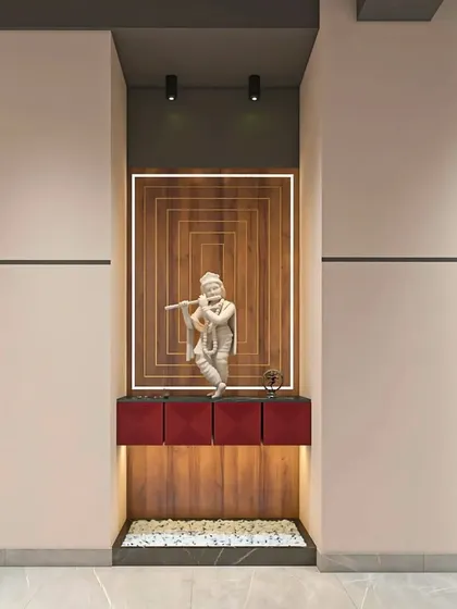 A serene pooja corner integrated into a modern office design. The backlit wooden panel and Krishna idol create a peaceful and spiritual focal point.