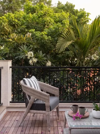 Another view of the comfortable and stylish outdoor chair, perfect for enjoying a morning coffee on the deck.