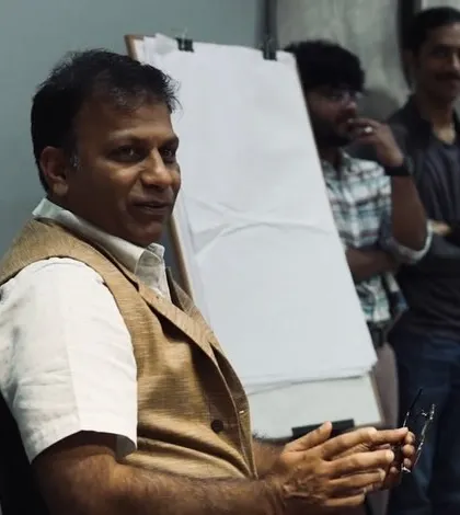 A senior team member in a meeting.