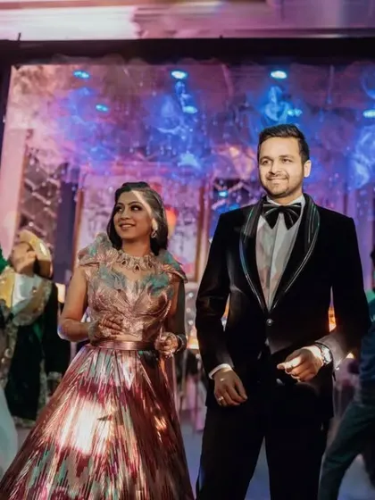 A Bollywood-themed entry for this lovely couple. I can create entries based on your favorite movies or songs.