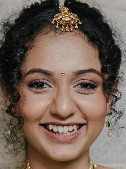 Another joyful, unedited close-up. My goal is to make you feel like the best version of yourself, and her smile is the perfect testament to that.
