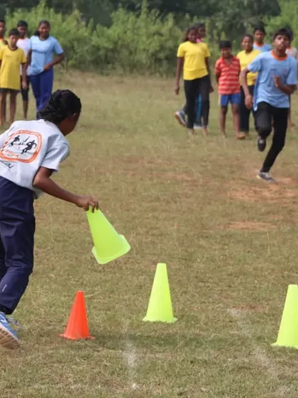 An agility race using cones. Even fun games can be designed to enhance athletic skills like speed and coordination.