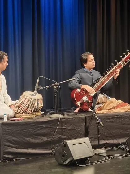On stage with my brother Khurram at SIFAS. This 'Strings of Legacy' concert was a tribute to our father's journey and the music he passed down to us.