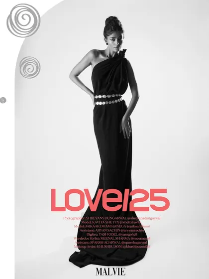 A graphic layout for Malvie Magazine, featuring a full-length black and white portrait.