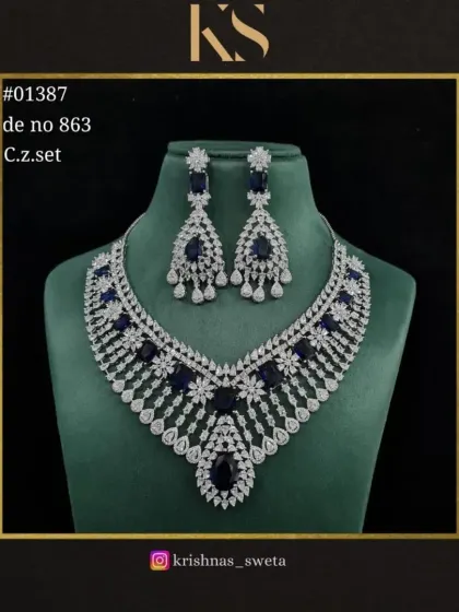 This C.Z. set is also available in a stunning sapphire blue.