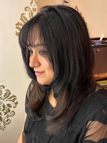 A side view of Priyanka's layered cut.