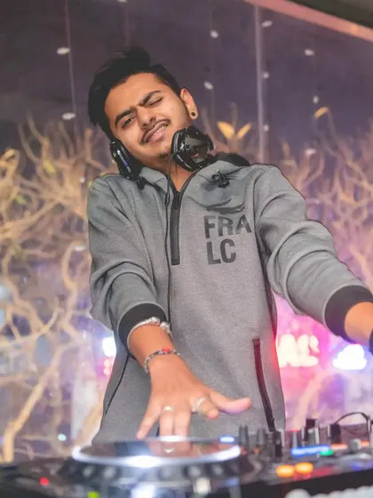 A moment of feeling the music. Sometimes you just have to close your eyes and connect with the beat before you share it with the world.