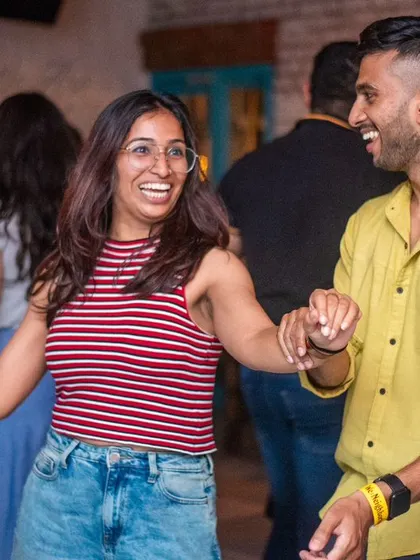 A happy and relaxed couple enjoying the music together.