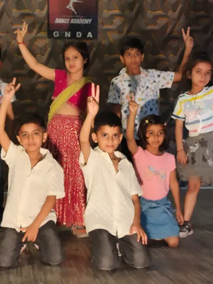 Our young performers posing after their dance routine. We create a supportive and encouraging environment for all students.
