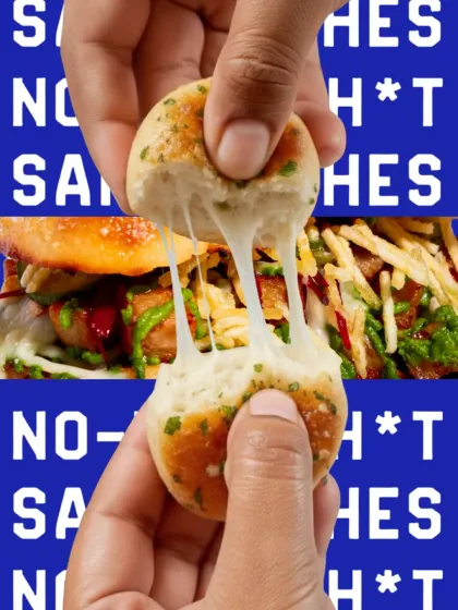 The irresistible cheese pull of my garlic knots, a key feature of my sandwiches.